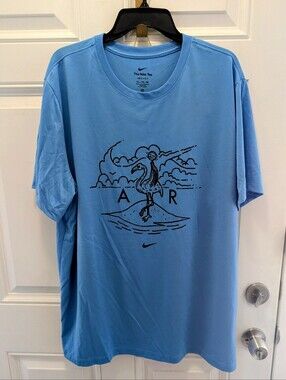 Nike Light Blue Short-Sleeve Graphic Tee with Flamingo AR Motif